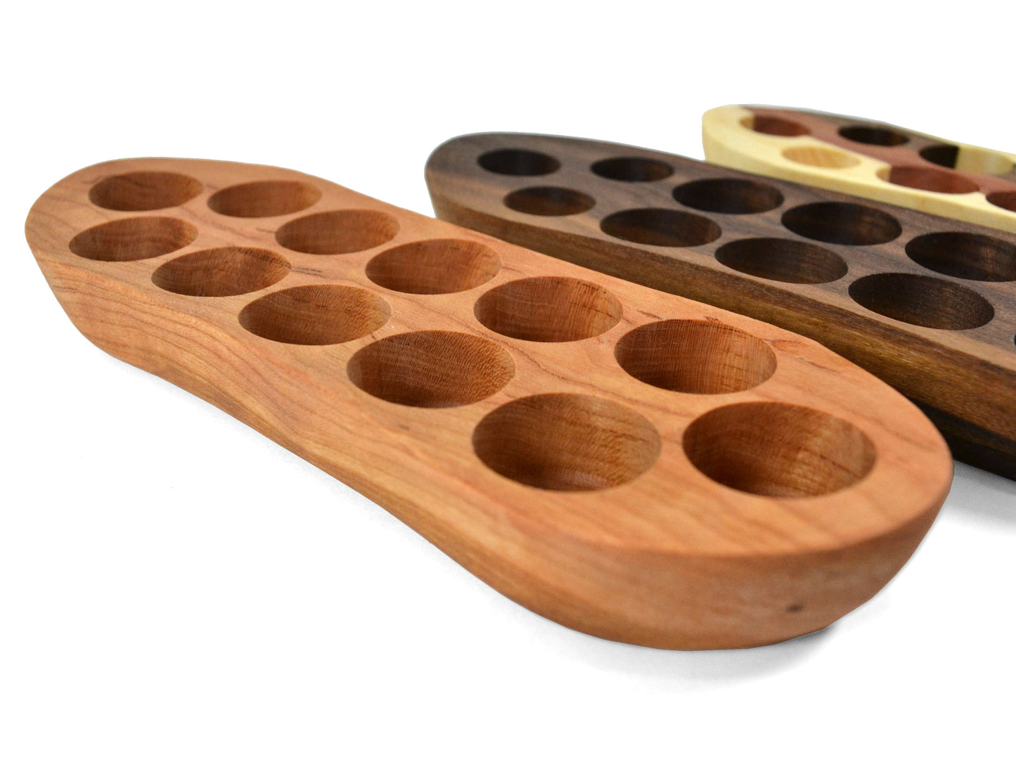 cherry wood essential oil bottle display with assorted wood choices