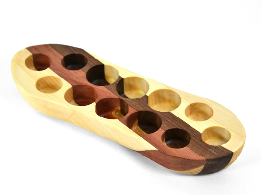 cedar and walnut striped essential oils boat display