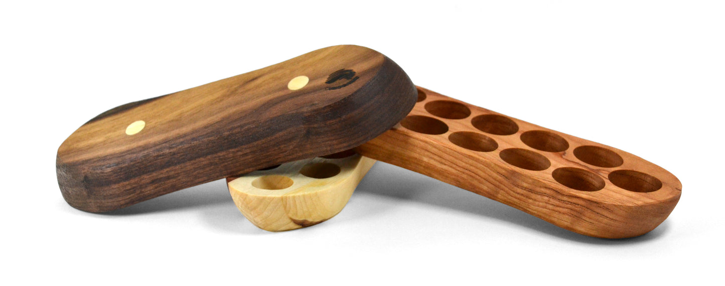 colorful oil bottle organizers in natural wood grai