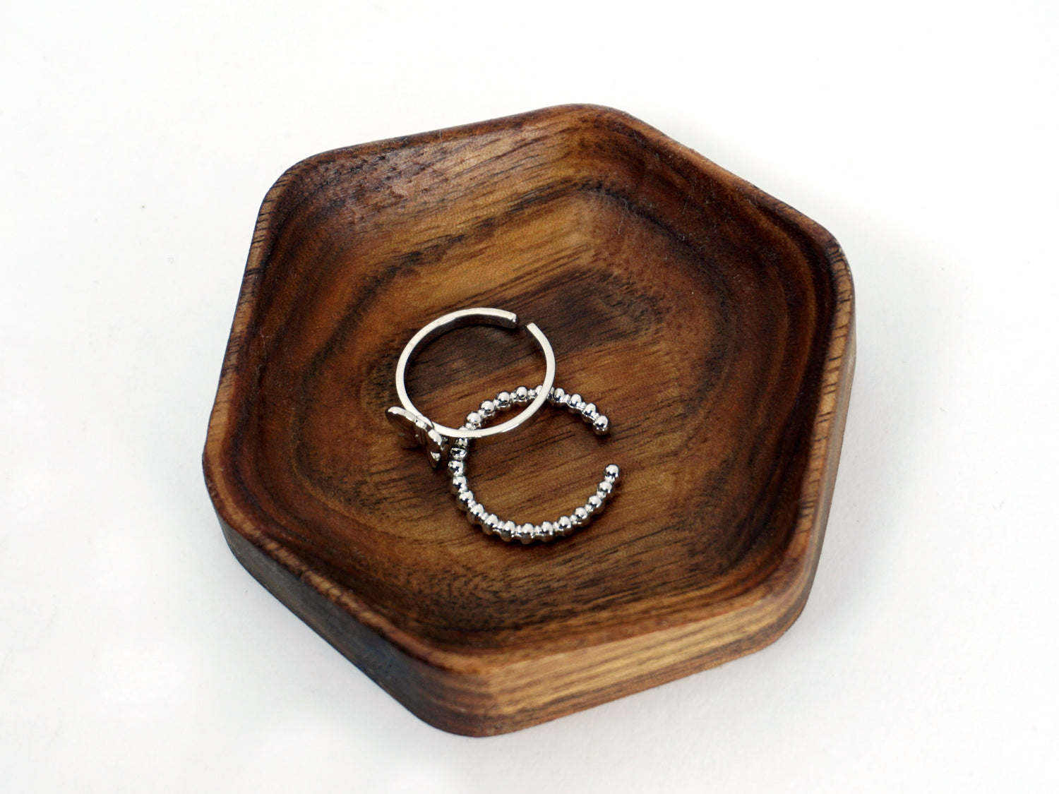 rings in a jewelry desk organizer tray