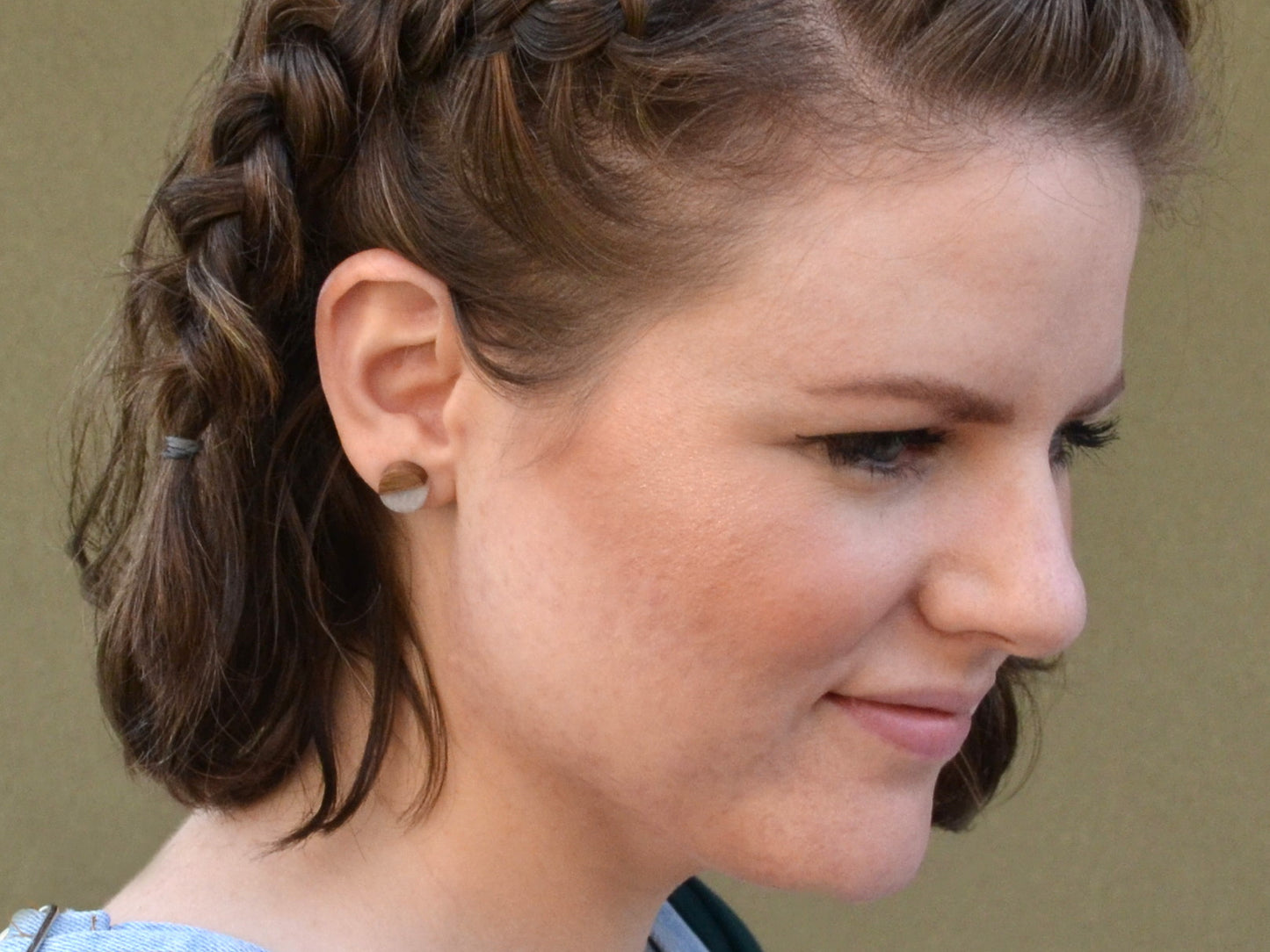 girl wearing snow white with dark walnut wood earring studs