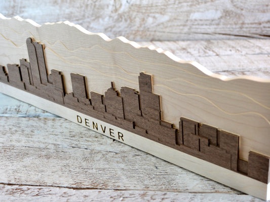 denver wood skyline artwork with rocky mountains