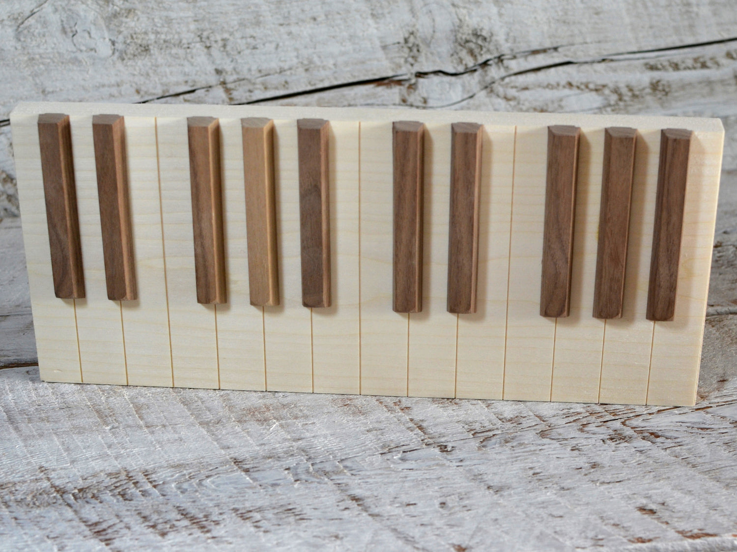 realistic wooden piano keys sculpture
