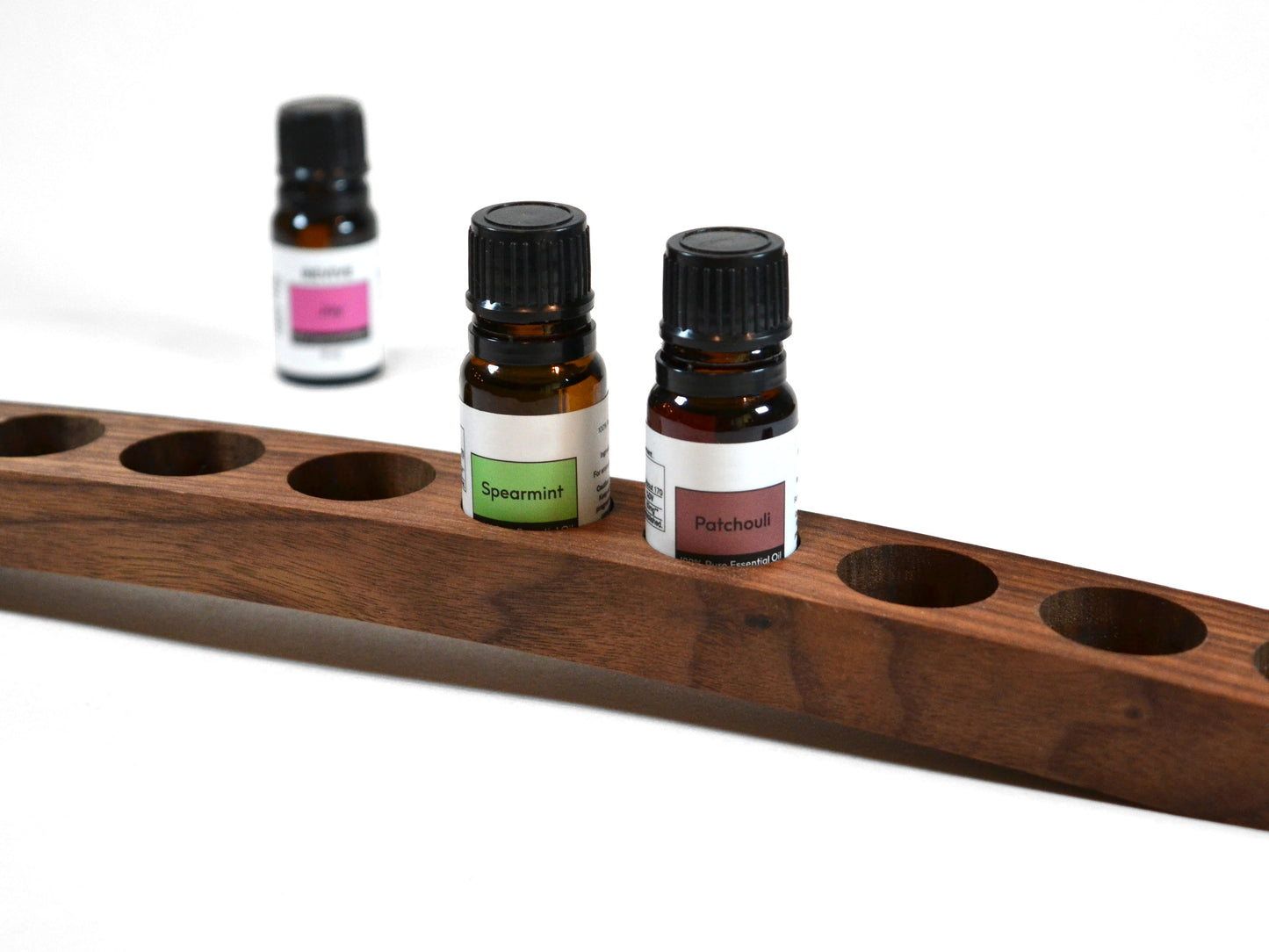 dark wood grain essential oils holder for revive brand