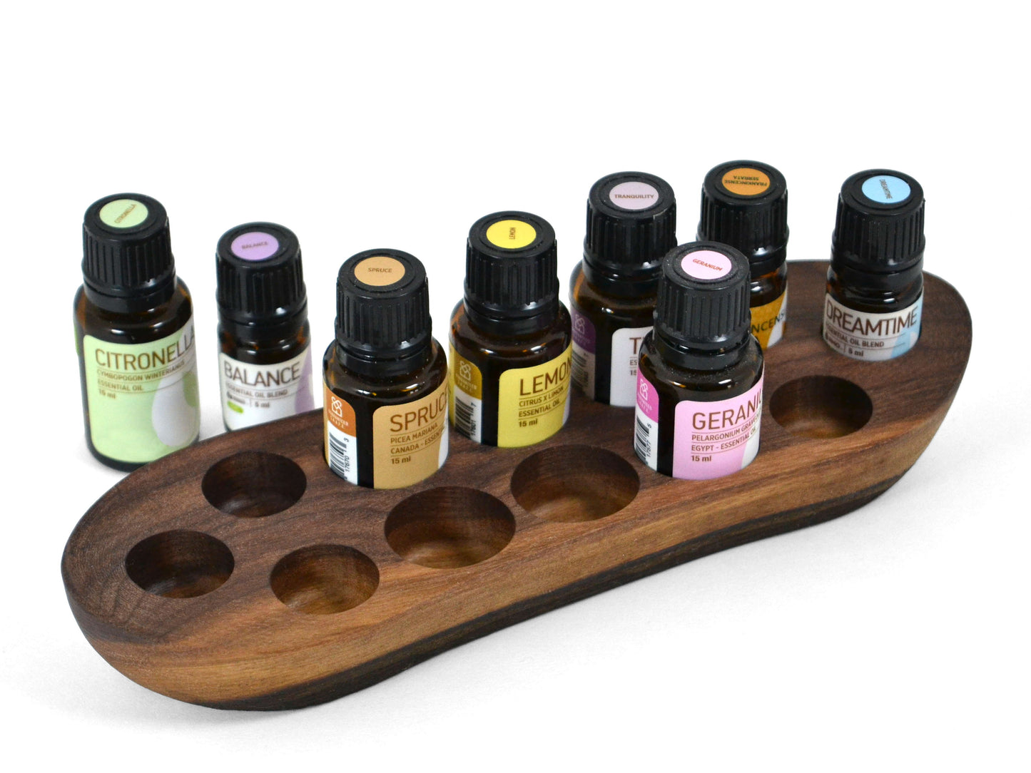 5mL and 15mL oil bottles fit into our walnut display holder