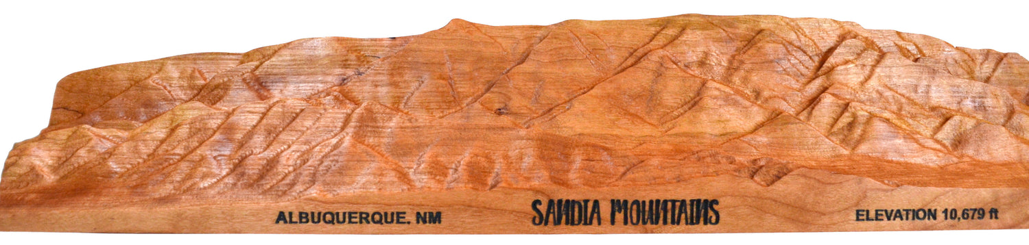 accurate sandia mountains wooden sculpture