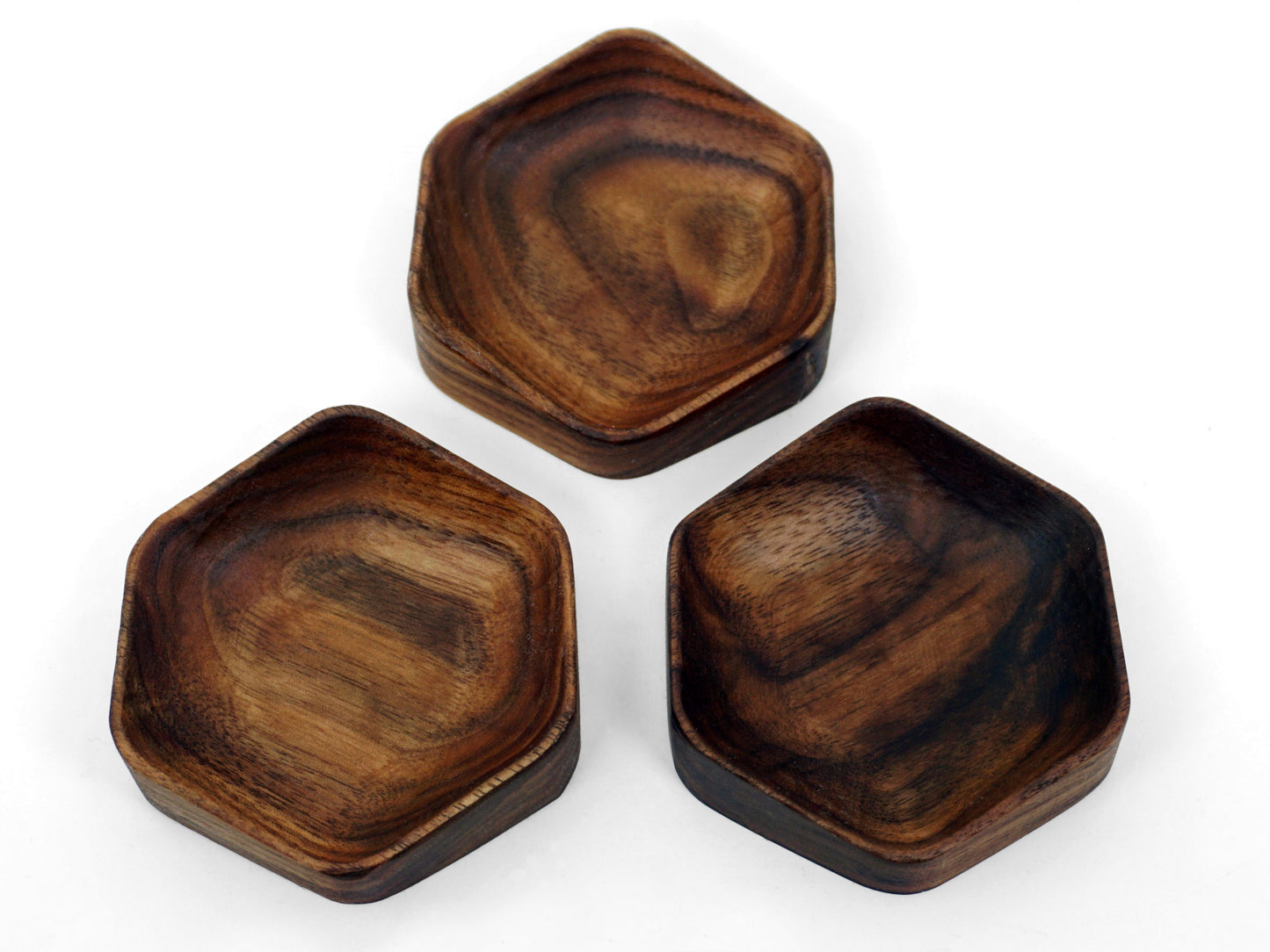 Group of small wooden ring dishes in a hexagonal shape