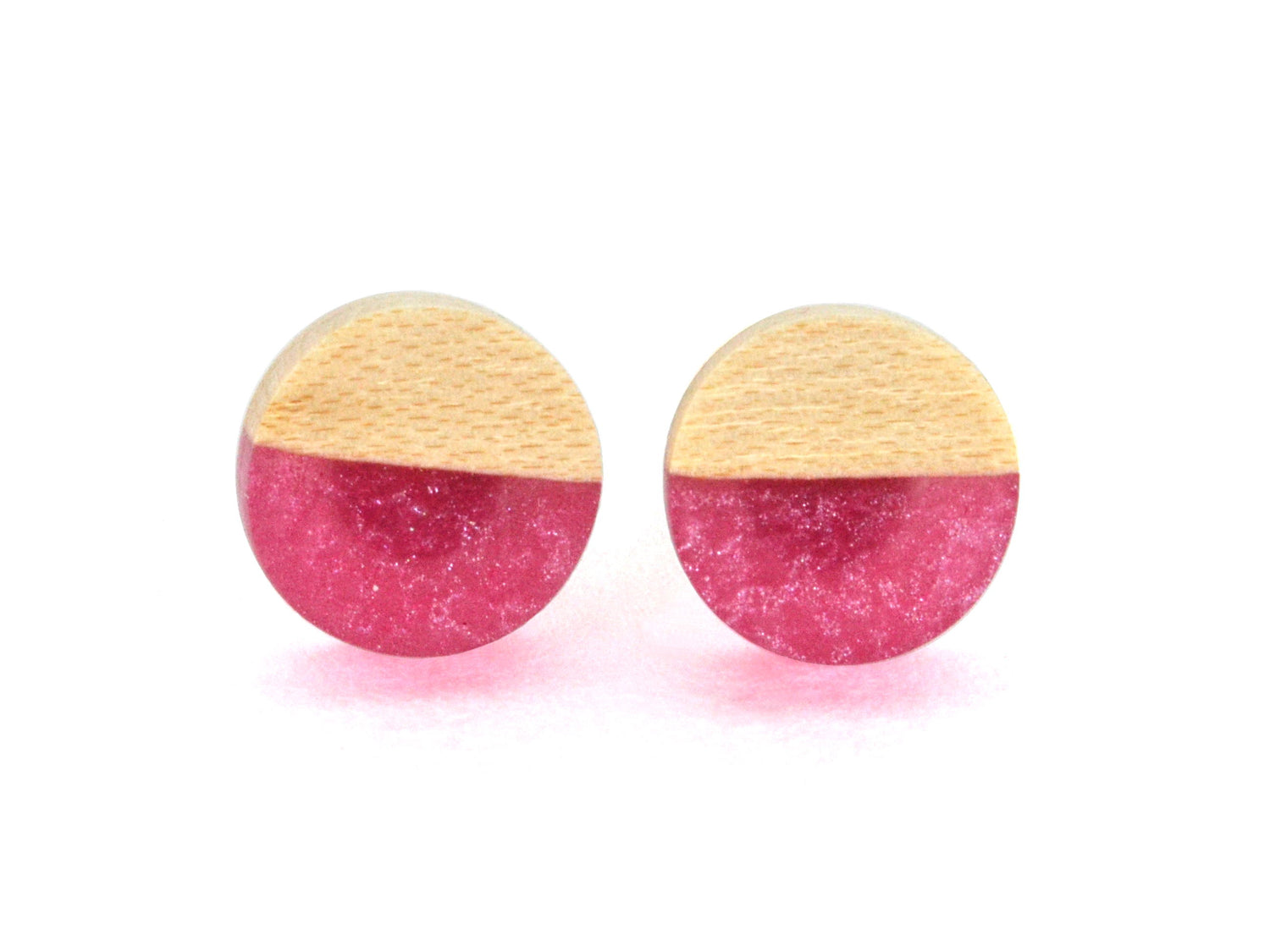 round maple wood stud earring pair with rose pink epoxy accent